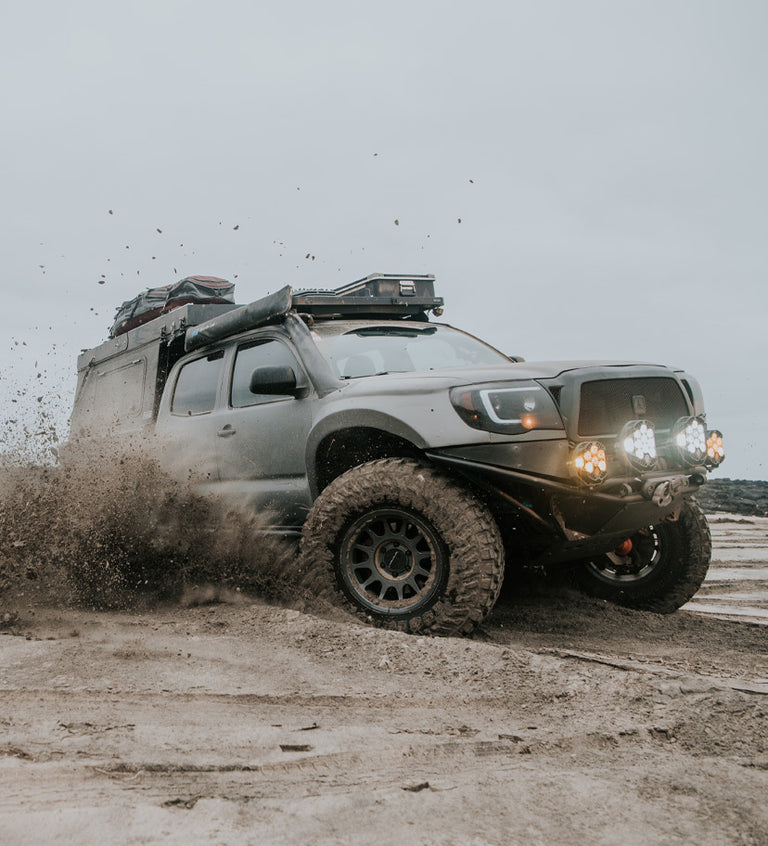 Toyota Tacoma offroad on Method Race Wheels 703 Bead Grip wheels.